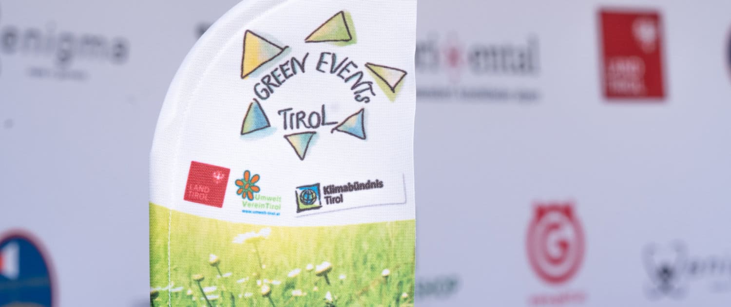 Ein Schild mit der Aufschrift Green Event Tirol