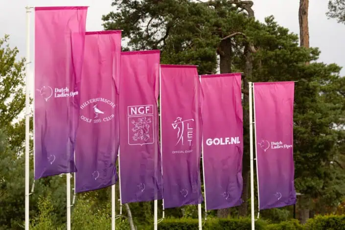 Several tournament flags from the Dutch Ladies Open